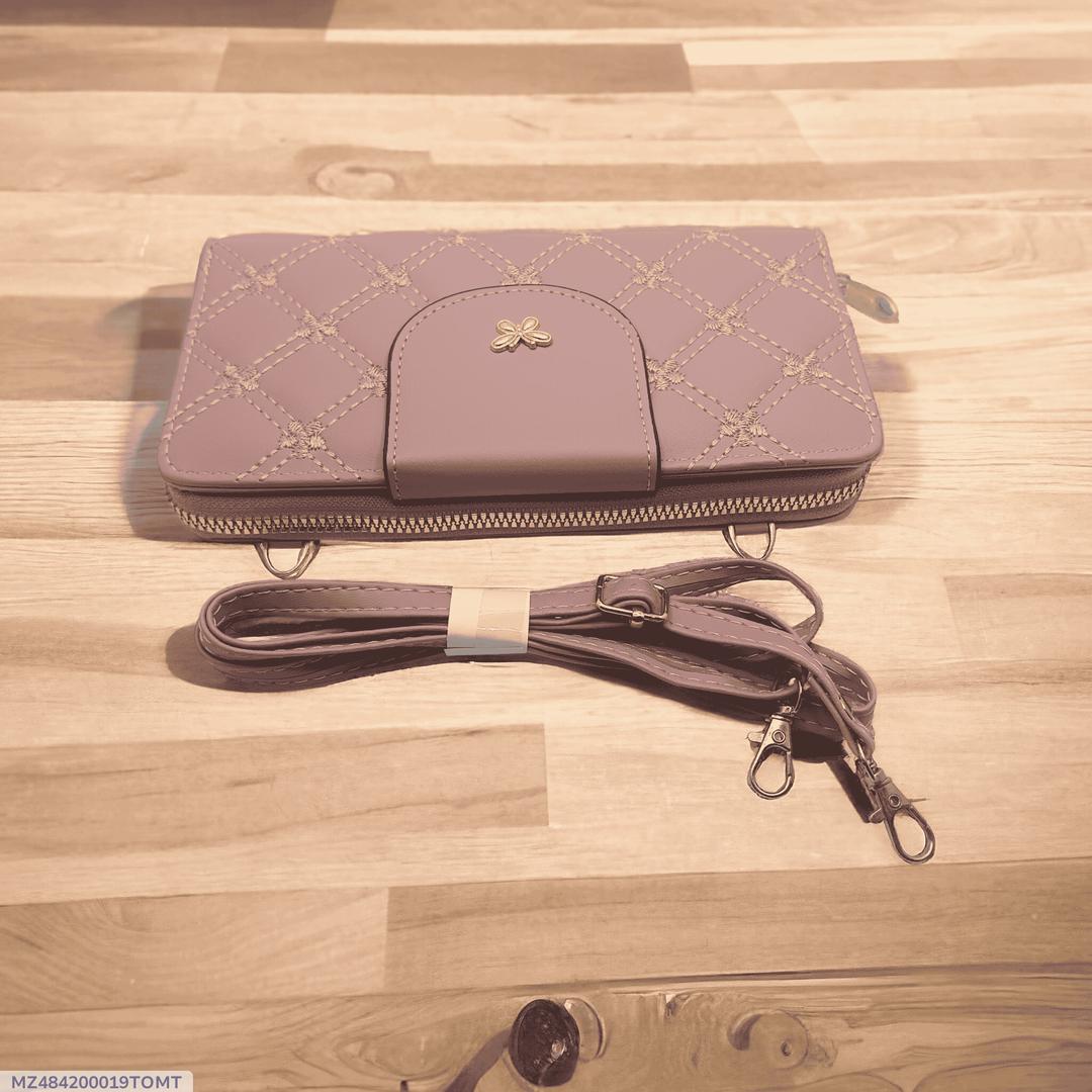 Woman's pu leather embroidered clutch